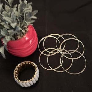 Slip on white bracelet and 14 silver/gold slip on bracelets